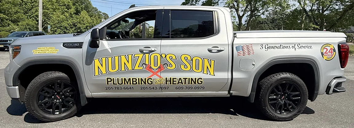 Pickup truck graphics for plumbing and hvac by Typestries Sign & Digital in New Jersey